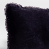 Carmen Sham | French Lavender | a close up of the corner of a charmeuse trimmed silk velvet pillow.