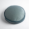 Paloma Throw Pillow | Mineral | 18" round charmeuse pillow with silk velvet trim at gusset shot from overhead on a white background