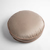 Paloma Throw Pillow | Pearl | 18" round charmeuse pillow with silk velvet trim at gusset shot from overhead on a white background
