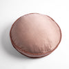 Paloma Throw Pillow | Rouge | 18" round charmeuse pillow with silk velvet trim at gusset shot from overhead on a white background