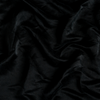 Taline Sham | Corvino | A close up of charmeuse fabric in Corvino, a black tone.