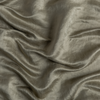 Paloma Bed Skirt | Fog | A close up of charmeuse fabric in fog, a neutral-warm, soft mid-tone grey.