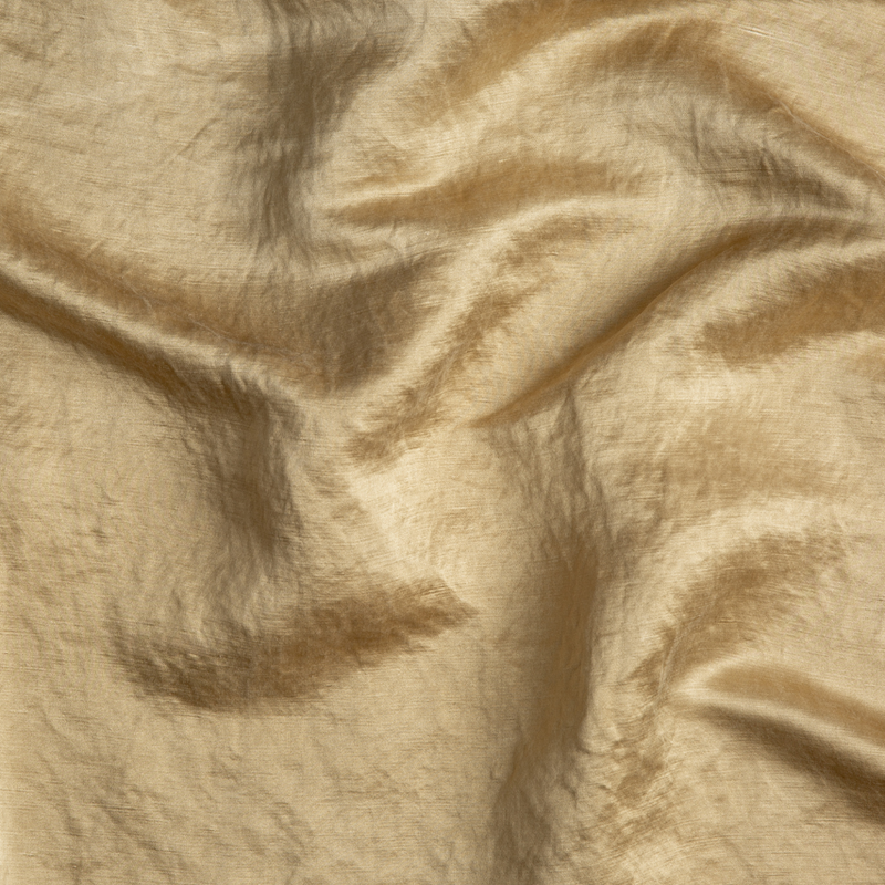 Paloma Blanket | Honeycomb | A close up of charmeuse fabric in honeycomb, a warm golden tone.