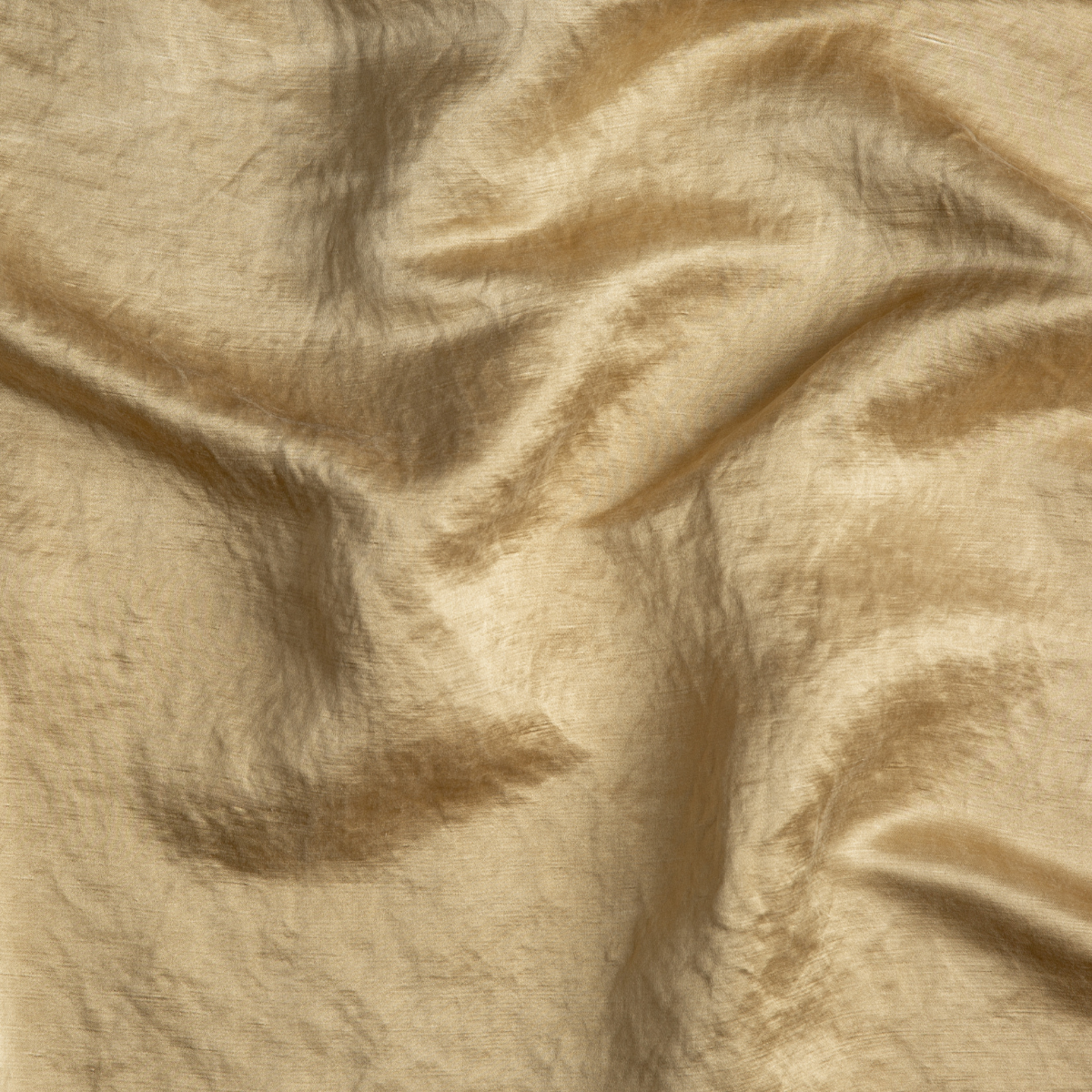 Taline Blanket | Honeycomb | A close up of charmeuse fabric in honeycomb, a warm golden tone.