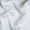 Charmeuse Swatch | White | A close up of silk linen charmeuse fabric in classic white.