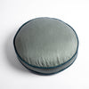 Paloma Throw Pillow | Eucalyptus | 18" round charmeuse pillow with silk velvet trim at gusset shot from overhead on a white background