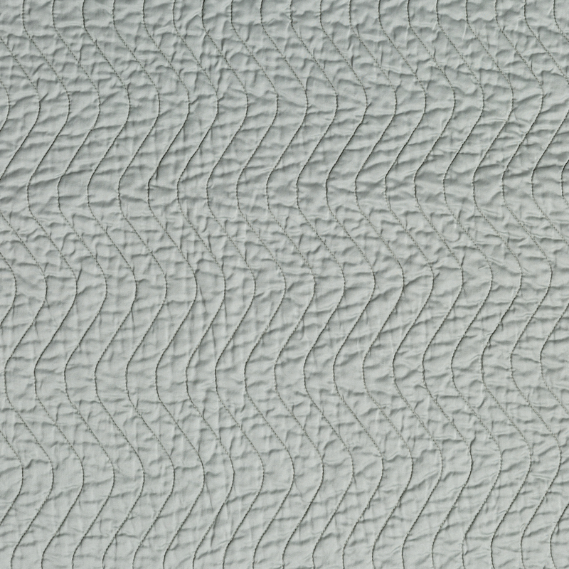 Cirillo Twin Coverlet | Eucalyptus | A close up of quilted cotton sateen fabric in eucalyptus, a soft light green.