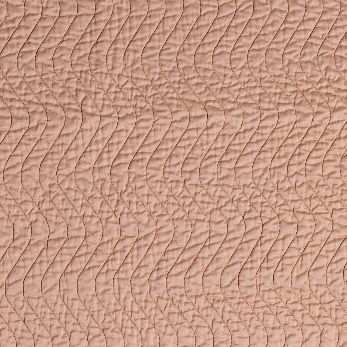Cirillo Twin Coverlet | Rouge | A close up of quilted cotton sateen fabric in rouge, a mid-tone blush pink.