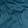 Cotton Sateen Yardage | Cenote | A close up of cotton sateen fabric in cenote, a vibrant, ocean-inspired blue-green.