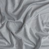 Cotton Sateen Yardage | Cloud | A close up of cotton sateen fabric in cloud, a soft, subtle sky blue-grey.