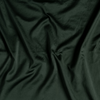 Bria Pillowcase (Single) | Juniper | A close up of cotton sateen fabric in Juniper, a deep green tone.