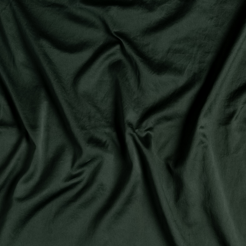 Cotton Sateen Swatch Card | Juniper | A close up of cotton sateen fabric in Juniper, a deep green tone.