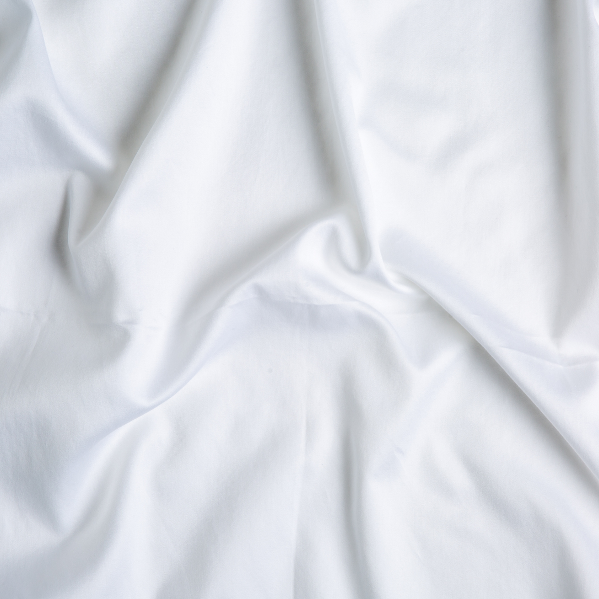 Bria Pillowcase (Single) | White | A close up of cotton sateen fabric in classic white.