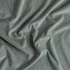 Harlow Blanket | Eucalyptus | A close up of cotton velvet fabric in eucalyptus, a soft light green.