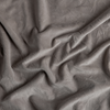 Harlow Sham | Fog | A close up of cotton velvet fabric in fog, a neutral-warm, soft mid-tone grey.