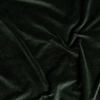 Harlow Crib Skirt | Juniper | A close up of cotton velvet fabric in Juniper, a deep green tone.