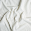 Cotton Velvet Swatch | Winter White | A close up of cotton velvet fabric in winter white, softer and warmer in tone than classic white.