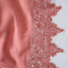 Frida Flat Sheet | Poppy | A close up of Frida, an antique cotton lace trim on a linen body, shown in poppy, a warm coral pink.