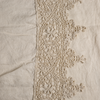 Frida Guest Towel | Parchment | A close up of frida cotton lace trimmed linen fabric in parchment, a warm, antiqued cream.