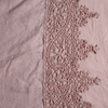Linen Pillowcase (Single) | Rouge | A close up of frida lace trimmed linen fabric in rouge, a mid-tone blush pink.