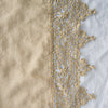 Frida Pillowcase (Single) | Honeycomb | A close up of Frida, an antique cotton lace trim on a linen body, shown in honeycomb, a warm golden tone.