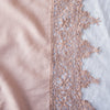 Frida Pillowcase (Single) | Rouge | A close up of Frida, an antique cotton lace trim on a linen body, shown in rouge, a mid-tone blush pink.