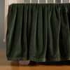 Harlow Crib Skirt | Juniper | coton velvet crib skirt shown on a light wood crib.