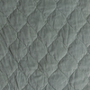 Harlow Twin Coverlet | Eucalyptus | A close up of quilted cotton velvet fabric in eucalyptus, a soft light green.