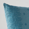 Ines Throw Pillow | Cenote | Close-up of pillow corner, showcasing the embroidery pattern detail.
