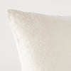 Ines Throw Pillow | Parchment | Close-up of pillow corner, showcasing the embroidery pattern detail.
