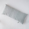 Ines Throw Pillow | Mineral | embroidered midweight linen 16x36 pilow overhead on a white background.
