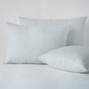 Ines Sham | Cloud | two shams leaning upright and one laying flat at an angle, against a white background.