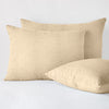 Ines Sham | Honeycomb | two shams leaning upright and one laying flat at an angle, against a white background.