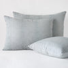 Ines Sham | Mineral | two shams leaning upright and one laying flat at an angle, against a white background.