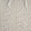 Ines Sham | Parchment | A close up of embroidered midweight linen fabric in parchment, a warm, antiqued cream.