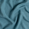 Linen Twin Duvet Cover | Cenote | A close up of linen fabric in cenote, a vibrant, ocean-inspired blue-green.
