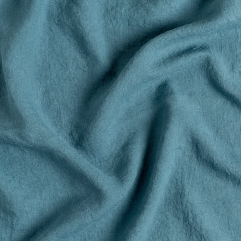 Linen Twin Duvet Cover | Cenote | A close up of linen fabric in cenote, a vibrant, ocean-inspired blue-green.