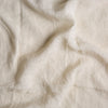 Linen Twin Duvet Cover | Parchment | A close up of linen fabric in parchment, a warm, antiqued cream.