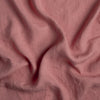 Linen Twin Duvet Cover | Poppy | A close up of linen fabric in poppy, a warm coral pink.
