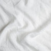 Linen Twin Duvet Cover | Winter White | A close up of linen fabric in winter white, softer and warmer in tone than classic white.