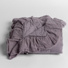 Linen Whisper Baby Blanket | French Lavender | folded baby blanket with a corner folded down showing the whisper-weight ruffle.