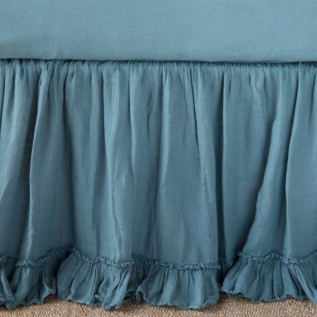Linen Whisper Bed Skirt | Cenote | Close up of bed skirt, showcasing ruffle detail - side view.