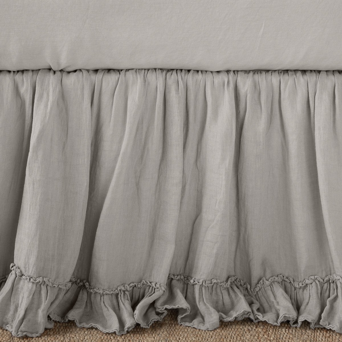 Linen Whisper Bed Skirt | Fog | Close up of bed skirt, showcasing ruffle detail - side view.