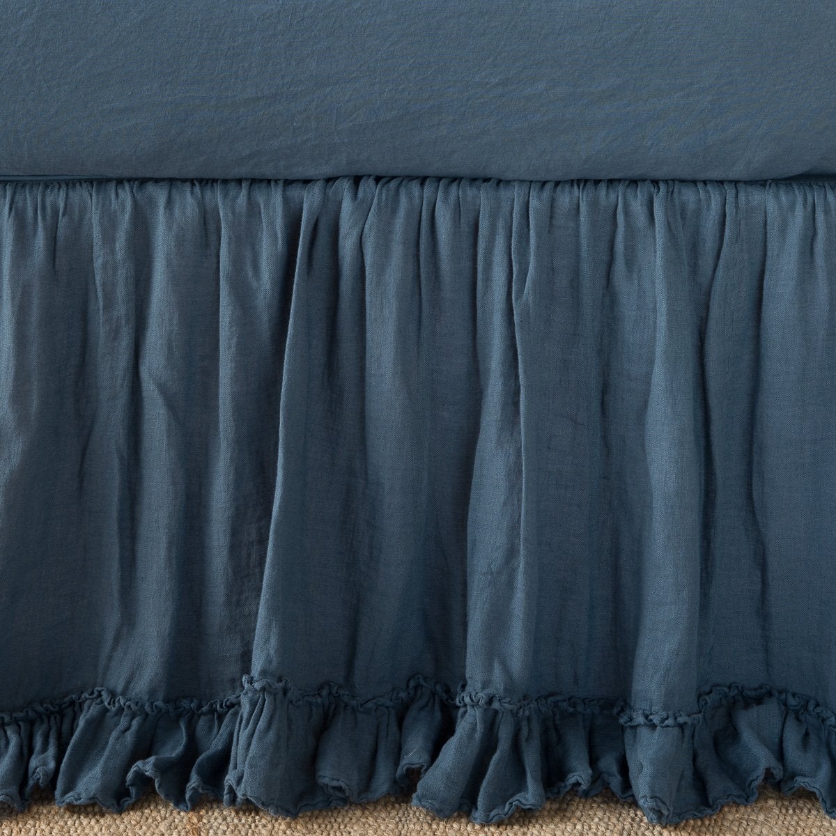 Linen Whisper Bed Skirt | Midnight | Close up of bed skirt, showcasing ruffle detail - side view.