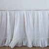 Close-up of Linen Whisper bed skirt, showcasing ruffle detail - white.