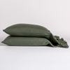 Linen Whisper Pillowcase (Single) | Juniper | pair of ruffled linen pillowcases stacked and shot against a white background.
