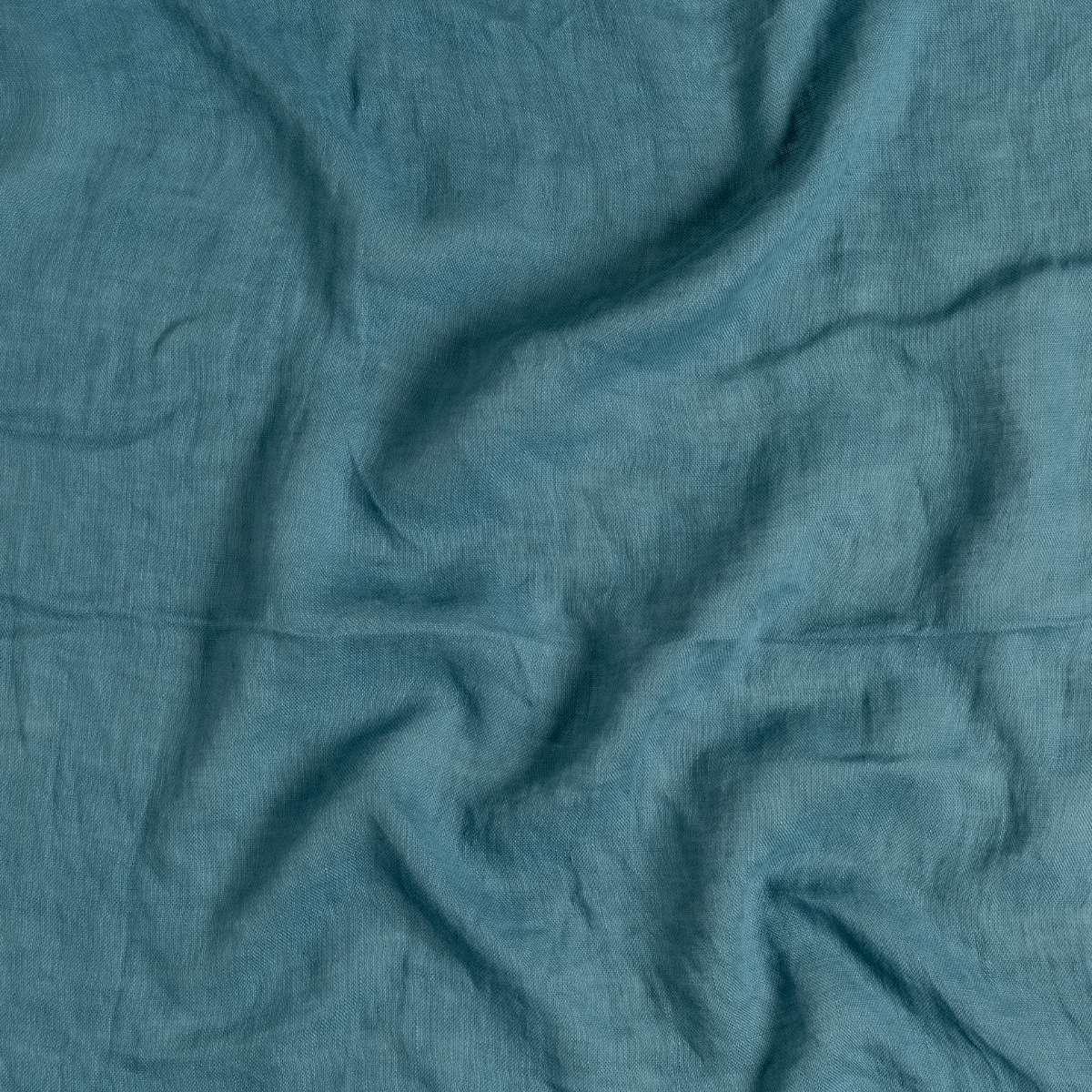 Linen Whisper Sham | Cenote | A close up of linen whisper fabric in cenote, a vibrant, ocean-inspired blue-green.