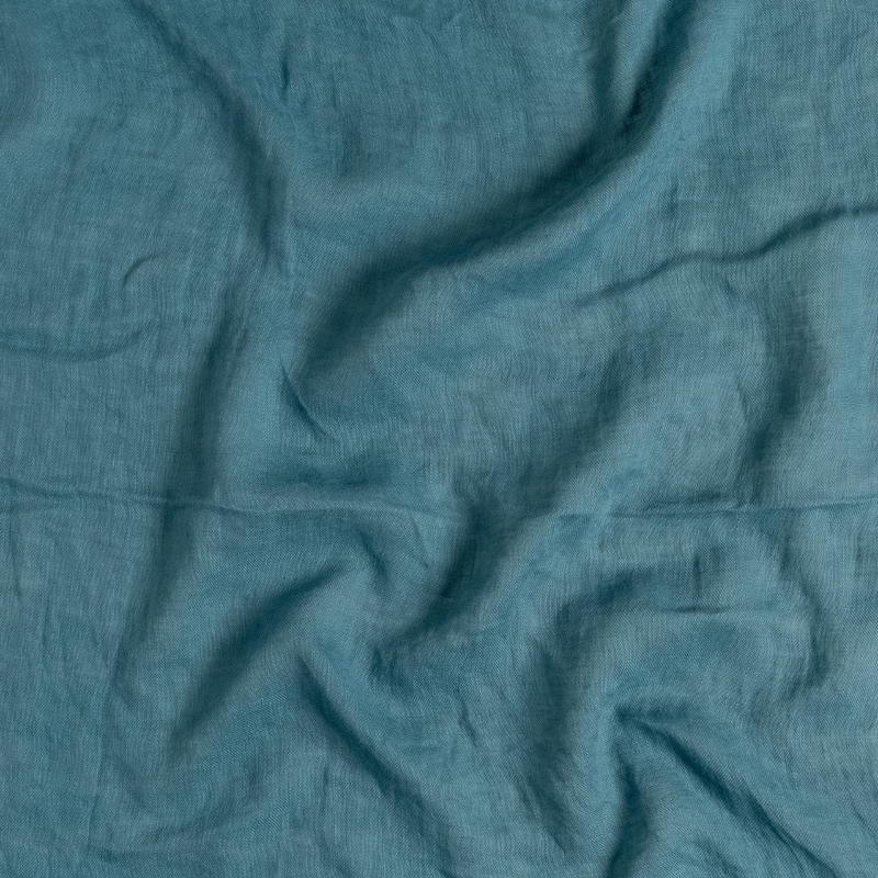 Linen Whisper Duvet Cover | Cenote | A close up of linen whisper fabric in cenote, a vibrant, ocean-inspired blue-green.