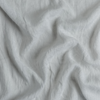Linen Whisper Yardage | Cloud | A close up of linen whisper fabric in cloud, a soft, subtle sky blue-grey.