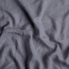 Linen Whisper Sham | French Lavender | a close up of linen whisper fabric in french lavender, a neutral violet tone.